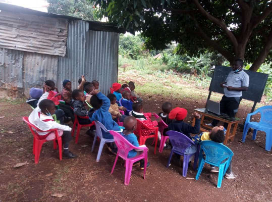 Children coding together